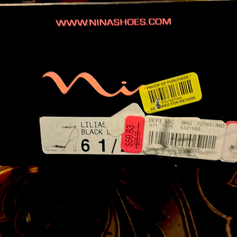 Black Nina with rhinestones in sizes 6 1/2.